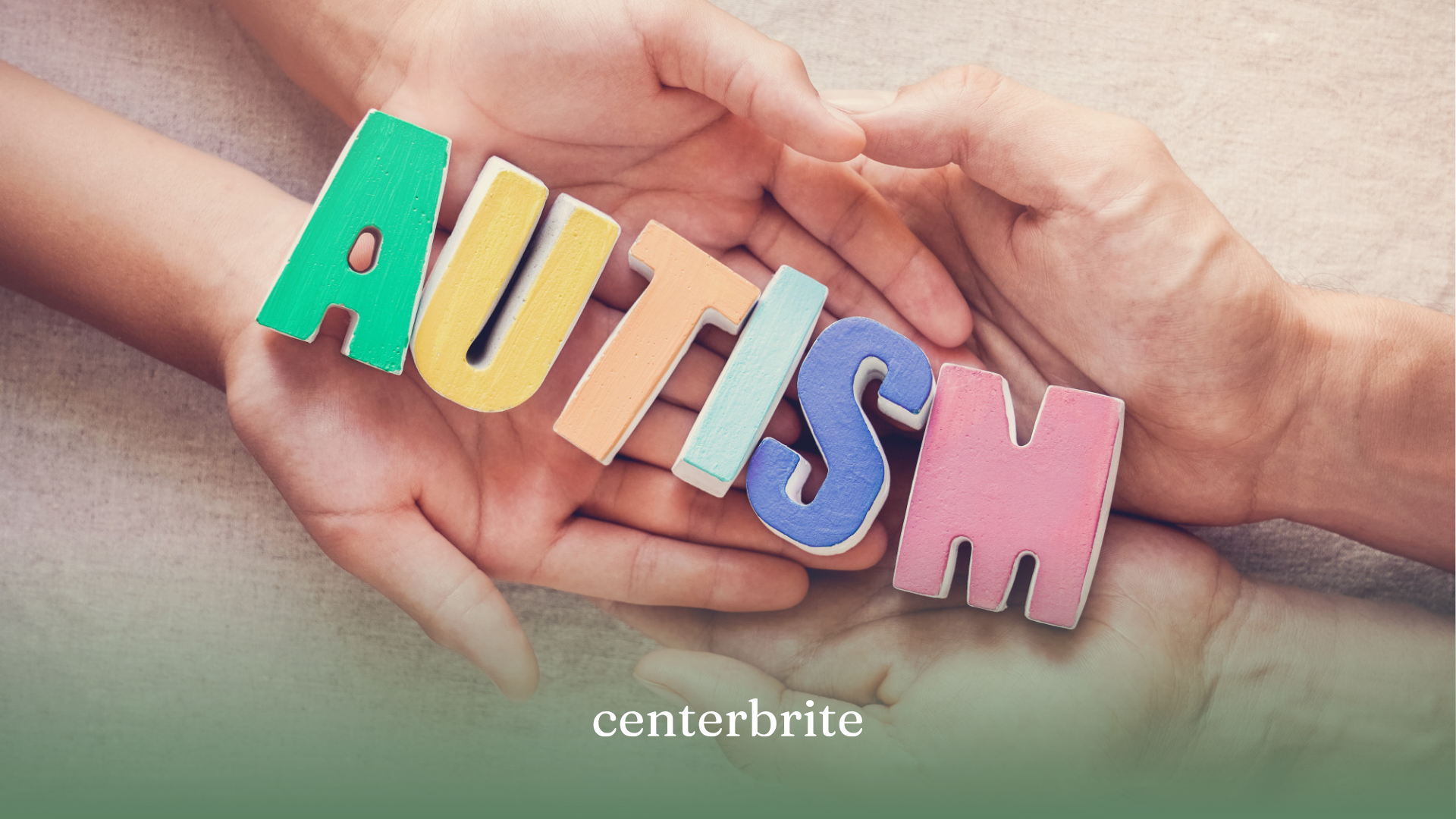 The word 'autism' spelled out in a cutout paper